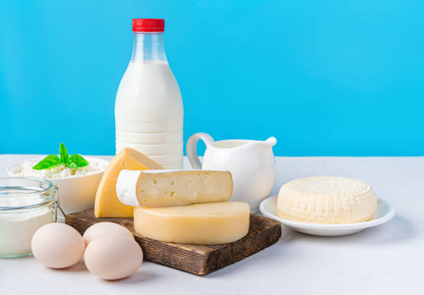 istock Assortment of dairy products on a blue background. 1434795021