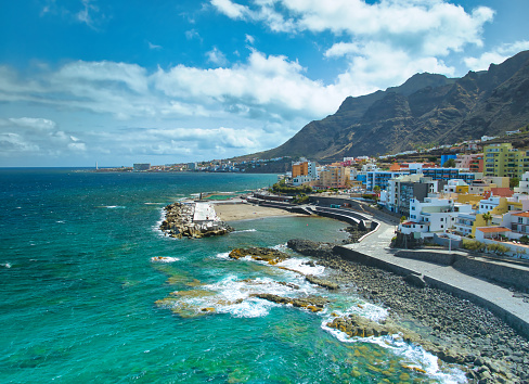 Aerial view of a  town called Bajamar, Tenerife with a beautiful turquoise and clear sea .