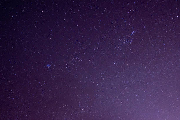 istock night photo with purple starry sky 1434795751