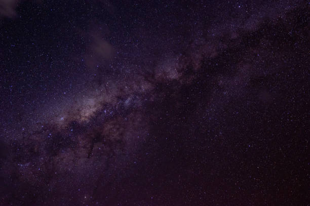 istock night photo with purple starry sky 1434795754