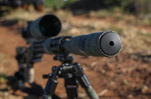 Close up of a hunting rifle and scope