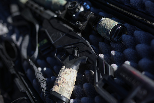 Close up of a hunting rifle and scope