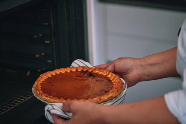 istock Preparing Pumpkin Pie for the Holidays in Domestic Kitchen 1434797560