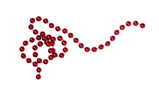 Red Christmas beads garland isolated on white. Parts of Christmas beads as an element for design.