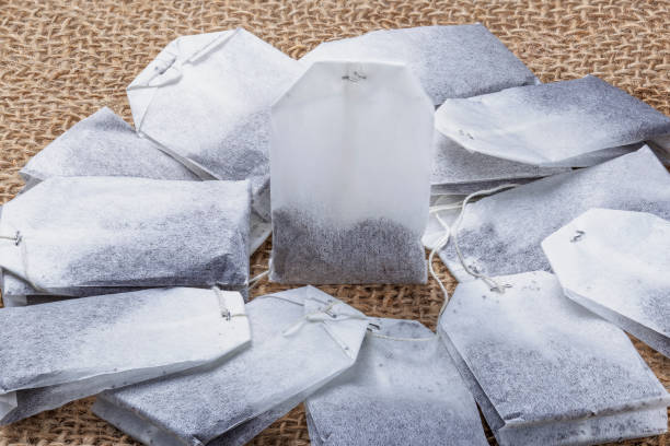 istock Tea bags with herbs for tea on the table. 1434801336