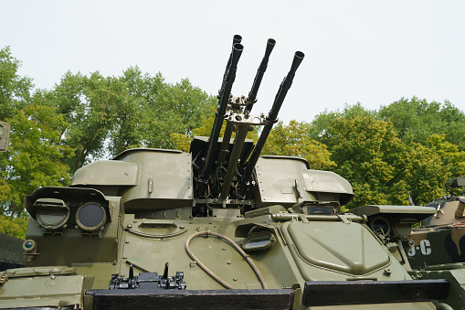 World War 2 Tank Firing Weapon on Battle Field. Omaha Beach. Normandy invasion