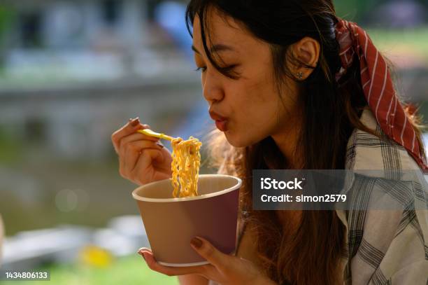 Young Asian Woman Eating Instant Noodles Morning Stock Photo - Download Image Now - 20-24 Years, Adult, Adults Only