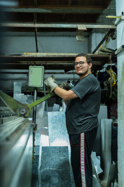 istock Employe of a locksmith are working on cutting material 1434808135