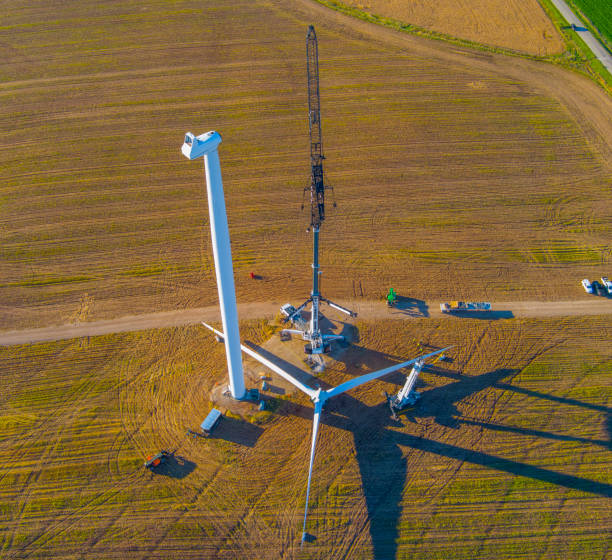 istock Crew replacing rotor blades on wind turbine 1434810845