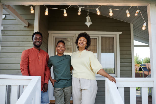istock Black Family Posing at New House 1434816458