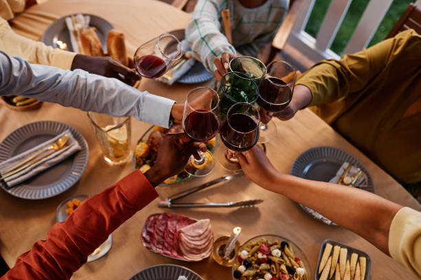 istock Family Toasting at Dinner Party Top View 1434816590