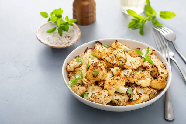 istock Roasted cauliflower with fresh herbs and spices 1434818334