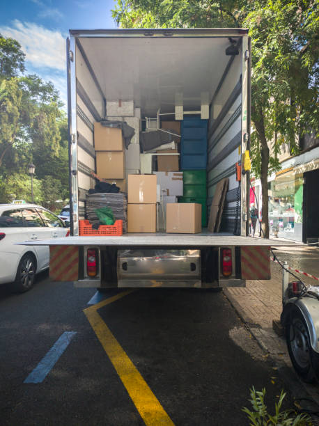 istock Semi-trailer moving truck loading at downtown street 1434818864