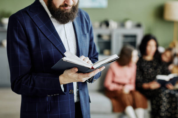 istock Jewish Man Reading Religious Book at Home 1434820191