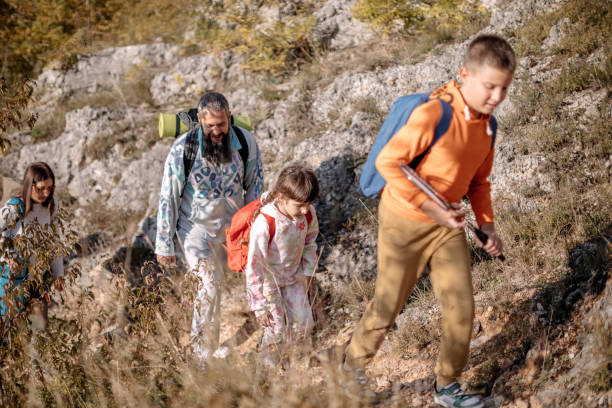 istock Multi-generation family enjoying on weekend in nature 1434826495