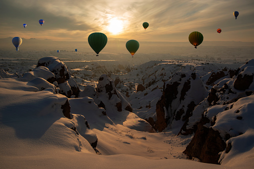Balloons in cappadocia. The longest sunset in Cappadocia is watched from the Red Valley. Nevsehir, Turkey