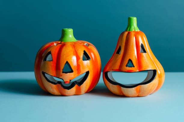 istock Halloween pumpkins on blue background 1434828328