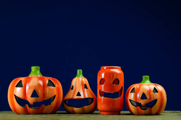 istock Halloween pumpkins on blue background 1434828396