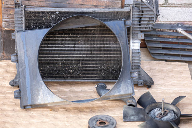 istock car engine cooling system repair, radiator and cooling fan. 1434834940