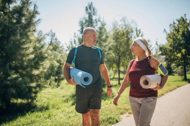 istock Mature couple going to exercise yoga 1434836535