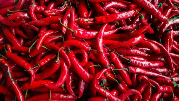 istock Closeup of red chilli peppers for background 1434836748