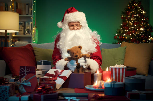 istock Santa Claus preparing Christmas gifts 1434838148