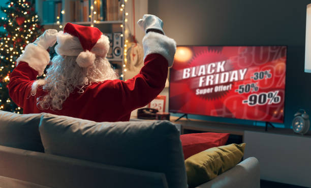 istock Santa watching a Black Friday TV commercial 1434838347