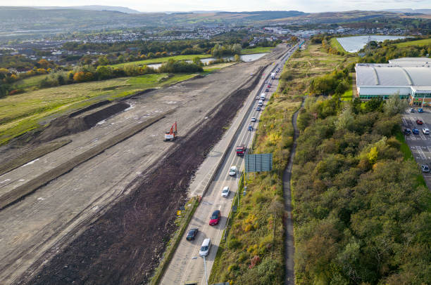 Aerial view of roadworks and traffic cones during the dualling of the A465 road in South Wales.  The project is anticipated to complete in 2025. Aerial view of roadworks and traffic cones during the dualling of the A465 road in South Wales.  The project is anticipated to complete in 2025. merthyr tydfil stock pictures, royalty-free photos & images