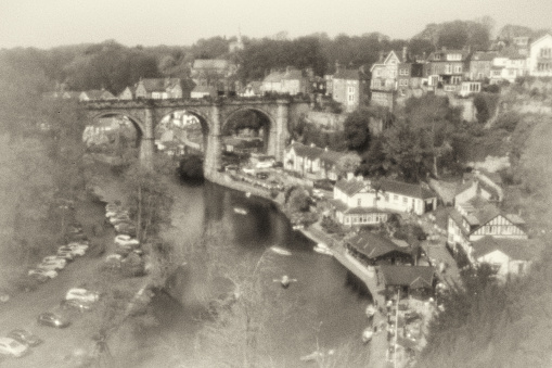 View of the railway viaduct over the river Nidd at Knaresborough in North Yorkshire, England, UK using a pinhole lens on a DSLR for this distinct retro style to the image
