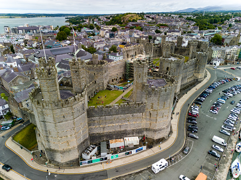 Aerial view of the ancient Caernarfon Castle in North Wales.  The castle is currently undergoing repair work and was used for the investiture of Prince's of Wales.