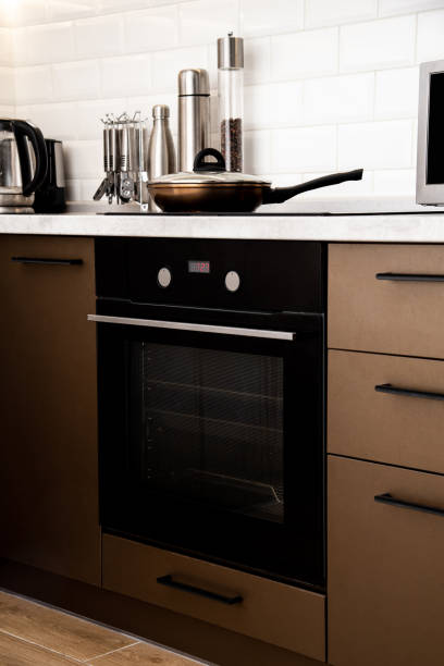 istock Frying pan in modern kitchen with induction stove 1434852118