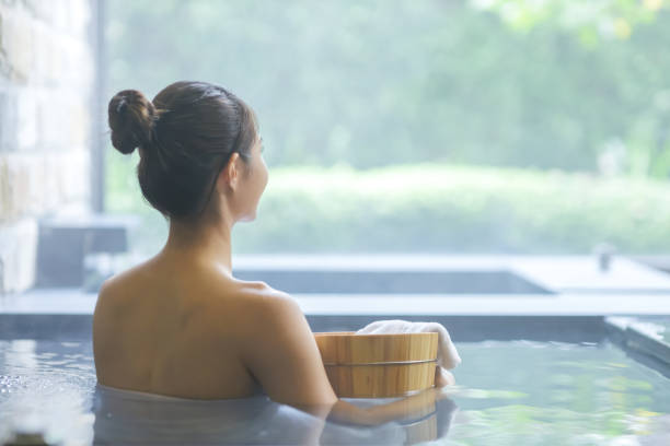 istock Woman in hot spring smile 1434855246