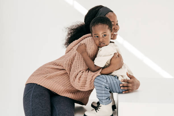istock Pregnant mother playing with toddler son 1434861017
