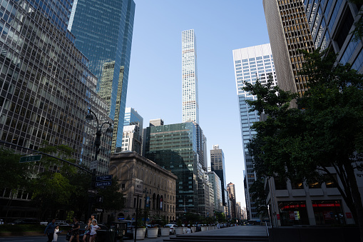 New York, NY, USA - June 4, 2022: The supertall 432 Park Avenue skyscraper, designed by Rafael Viñoly, on Billionaires' Row, seen from Park Avenue.