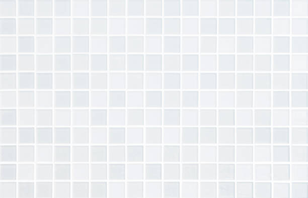 istock White tile wall chequered background bathroom floor texture. Ceramic wall and floor tiles mosaic background in bathroom and kitchen clean. Design pattern geometric with grid wallpaper decoration pool. 1434866622