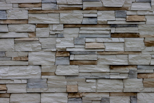 istock Background of a wall made of bricks of different sizes. 1434866968