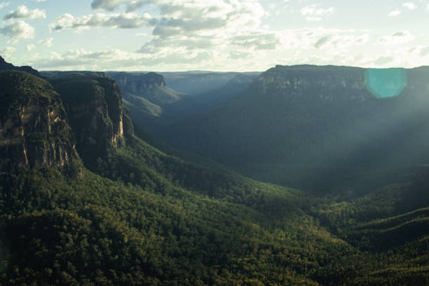 istock Green mountains with a blue sky and some clouds 1434867665