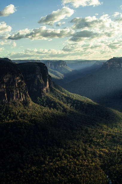 istock Green mountains with a blue sky and some clouds 1434868723