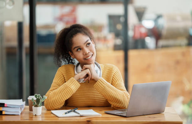 istock studentwoman working in a cafe 1434877901