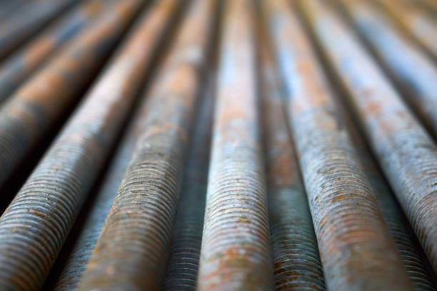 Condensing unit steel close up wire finned obsolete table grill perspective texture, compressor and air conditioning system. Selective focus, industrial background metal material industry rib heater.