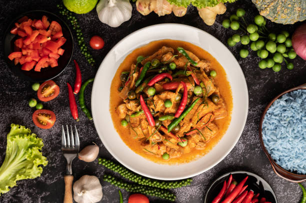 istock Red curry with pork in a white plate 1434884400