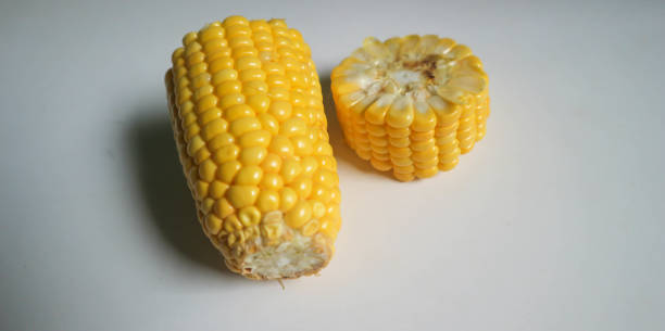istock Corn peeled and chopped isolated on white background 1434889012