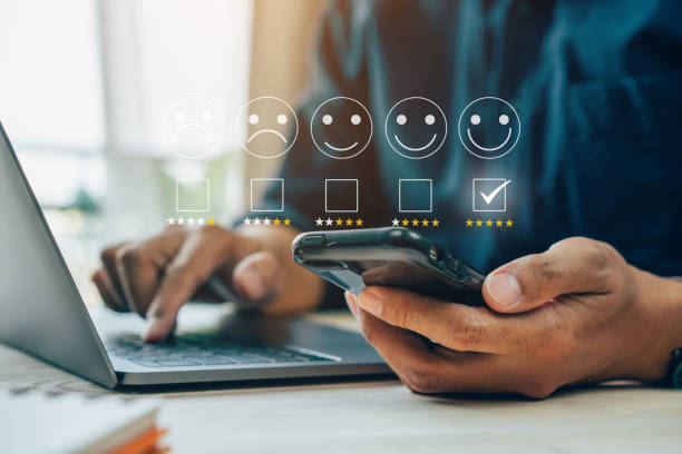 istock User give rating 5 star to service experience on online application. 1434899002