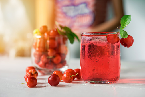 Cherries drink with fresh cherry, Cherry juice, on wood background