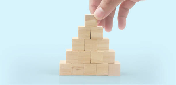 istock Wooden cubes in hand with copy space for input wording 1434901870