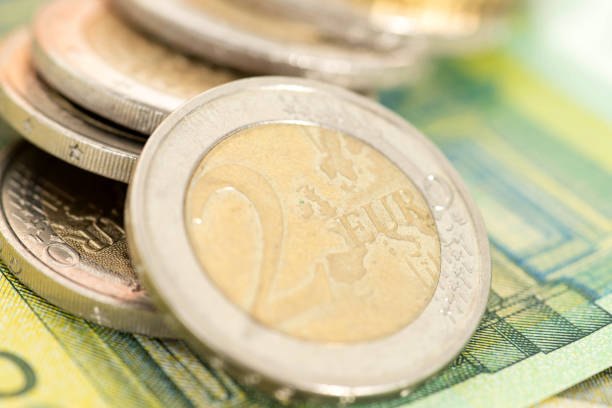istock Euro banknotes and coins 1434905718