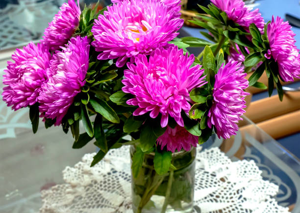 istock pink bouquet of asters in a vase 1434906008