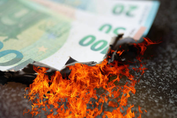 istock Fire destroys euro banknotes 1434906528