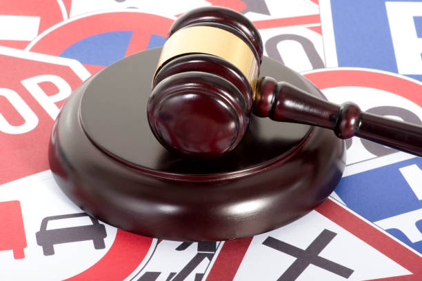 istock Traffic signs and a judge's hammer 1434906610