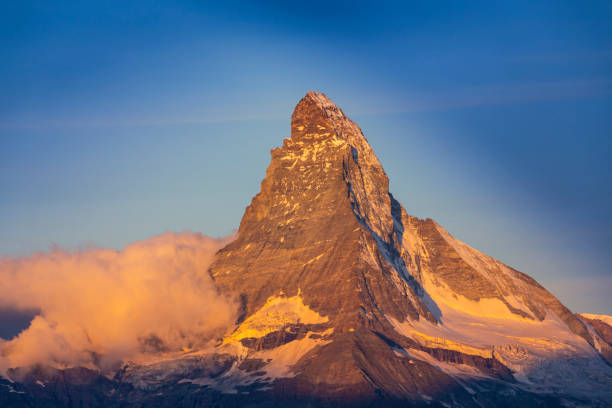 istock Beautiful alpine scenery in the Swiss Alps in winter, with dramatic cloudscape 1434907322